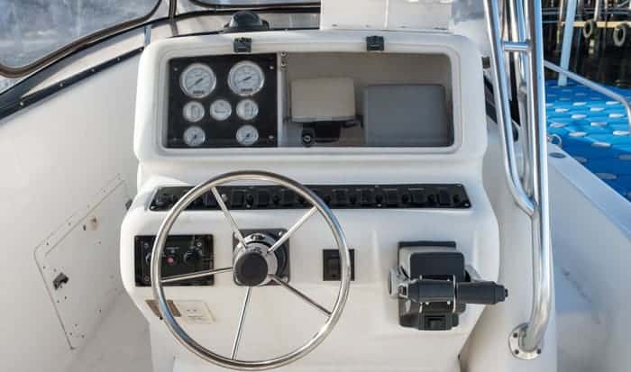 Why-are-boat-steering-wheels-on-the-left