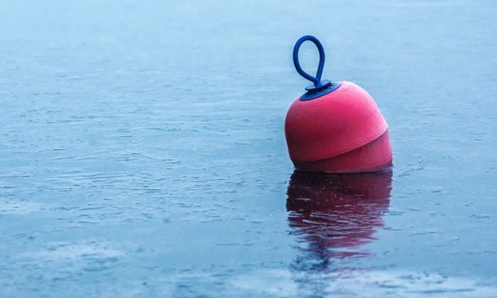 when returning to port from seaward and you see a red buoy how should you respond