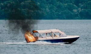 what should you do if a fire breaks out in the back of your boat